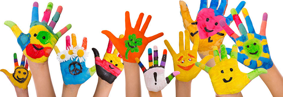 Kids hands painted with smiley faces